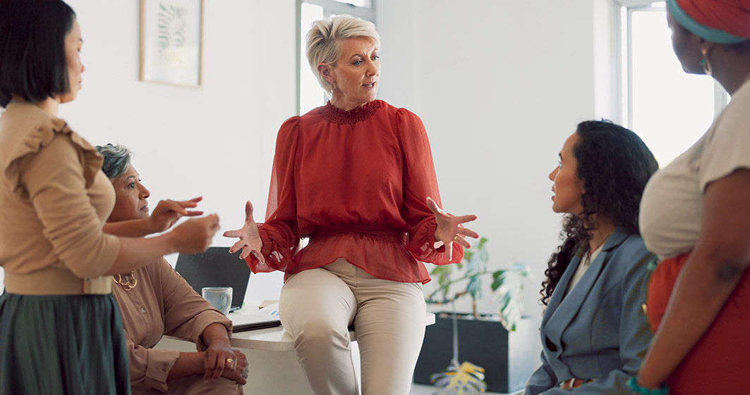 Woman leading discussion.