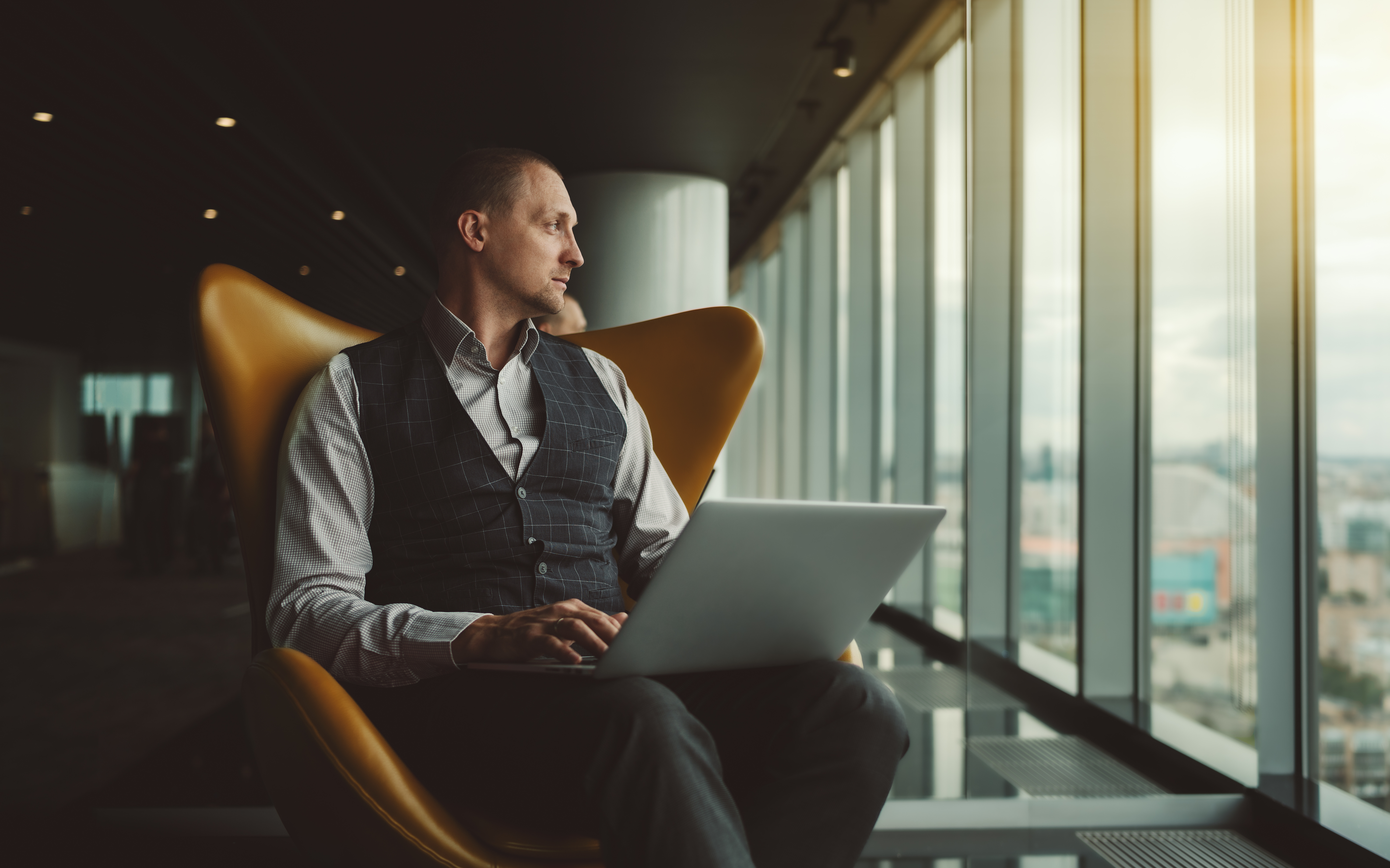 Man sitting by window